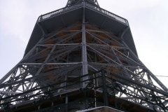 The Eiffel Tower stands tall on Petřín