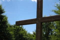 A cross frames the sky on Mount Istállóskő