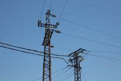 Power of Hungary: pylons against a rich blue sky