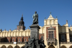Adam Mickiewicz stands tall before Sukiennice