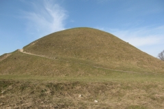 Krakus mound against a blue sky