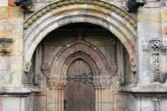 The carvings around the south door of the chapel