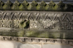 The fine carving along the roof-line