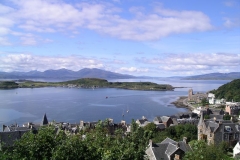White clouds hang in the sky over Oban Bay